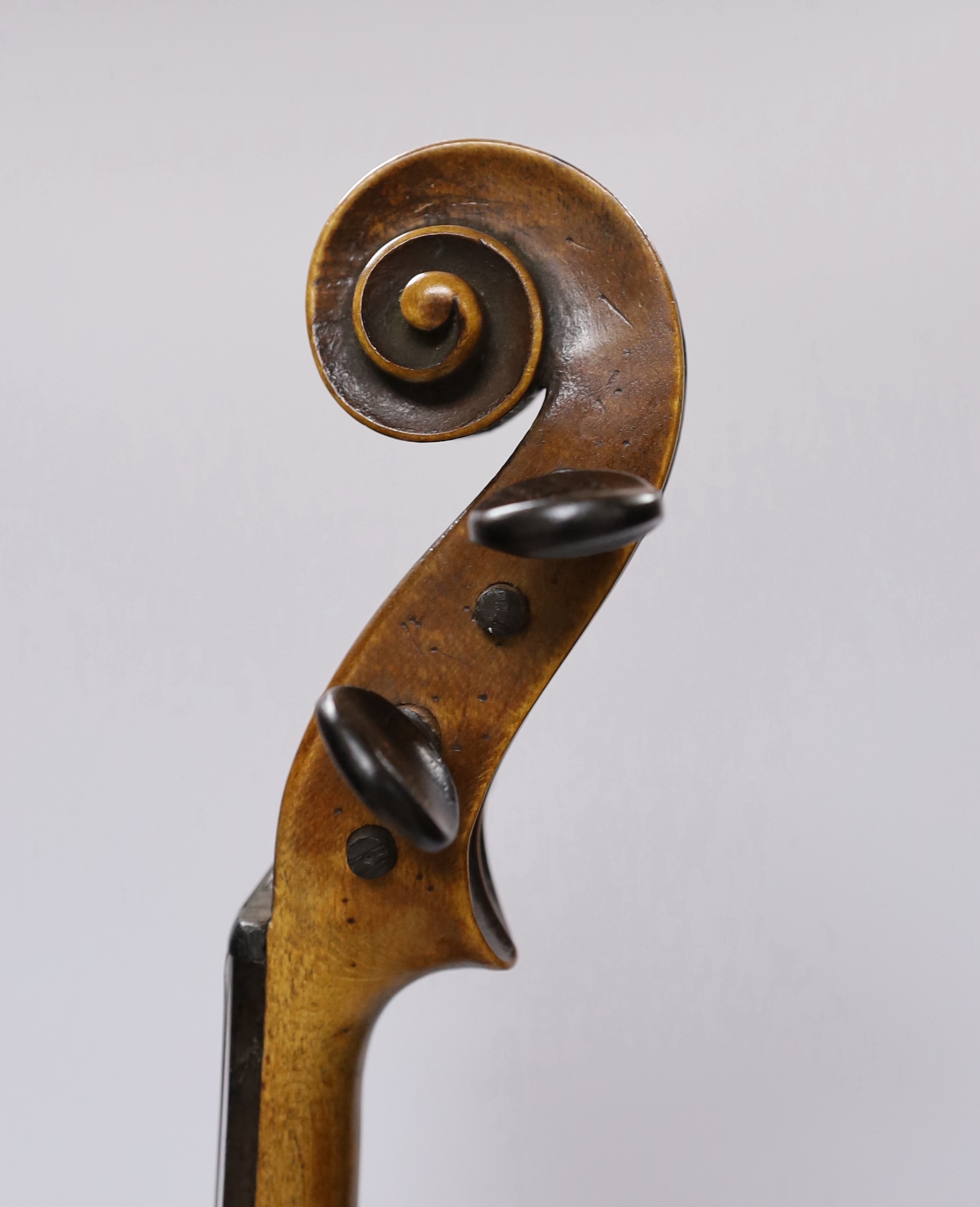 An early 20th century English violin stamped Norman Duke, London, one piece back with wax seal, cased, violin 60cm long